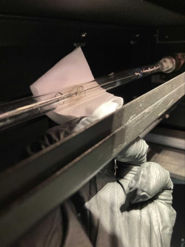Wiping the Fuse 1's heater tube with a PEC*PAD