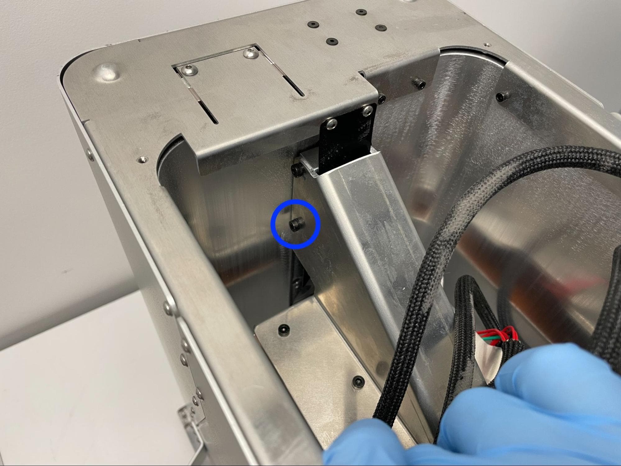 Check the piston arm bracket screws