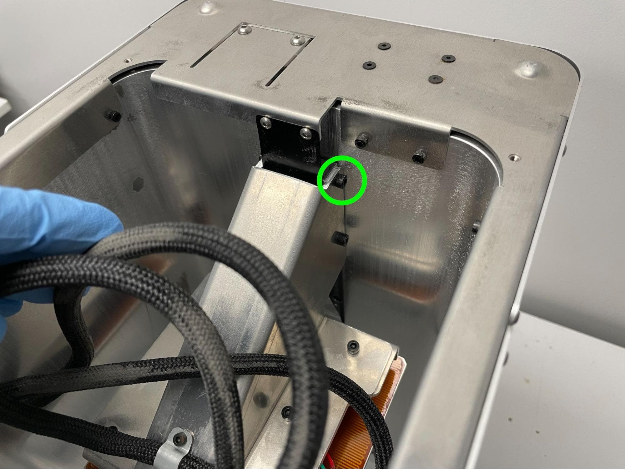 Check the piston arm bracket screws