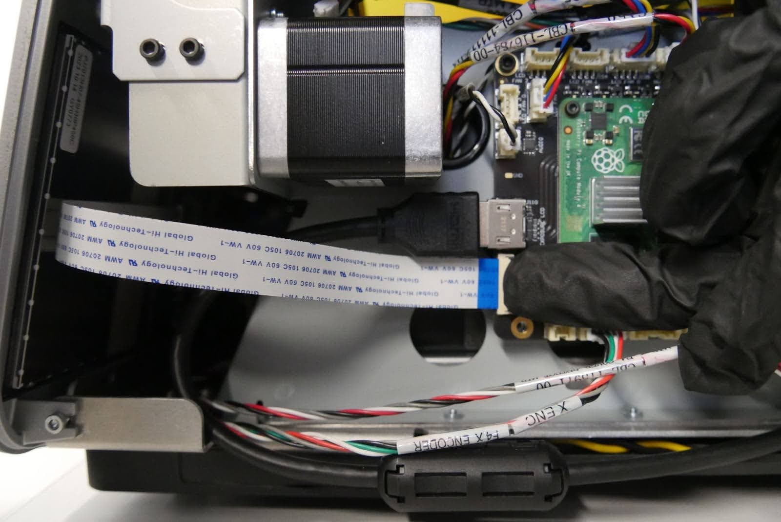 Step 7: Reconnect the touchscreen ribbon cable
