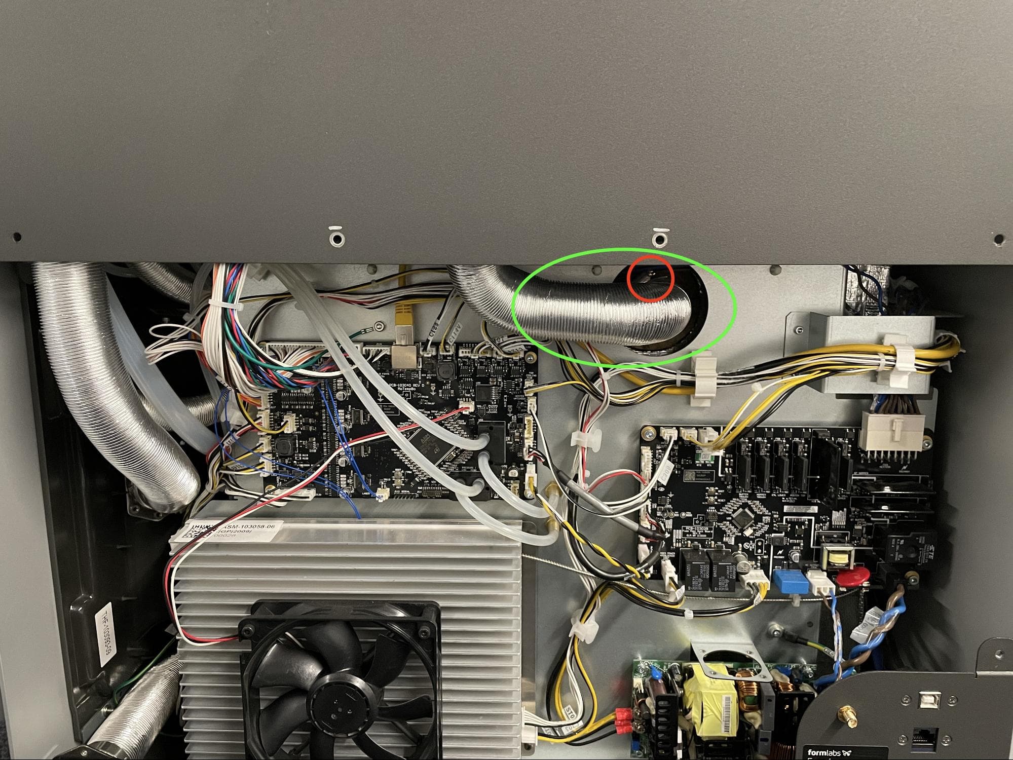 Step 3: Locate the exhaust duct and ring clamp