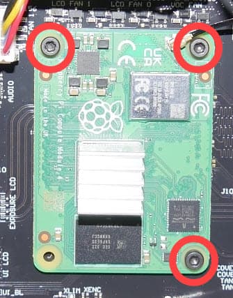 Remove the SOM mounting screws