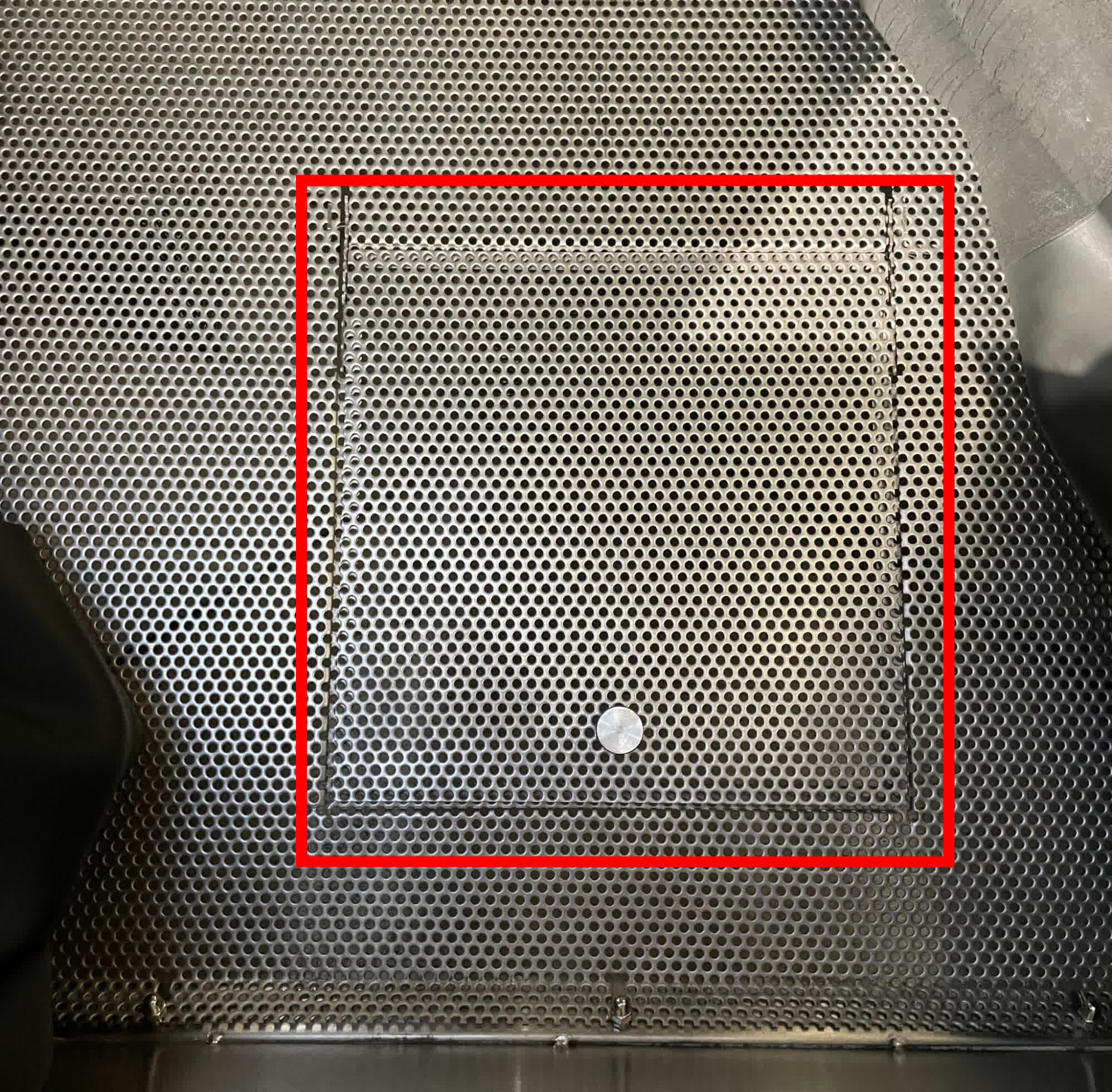 Step 3: Lift the grate to access the catch chute