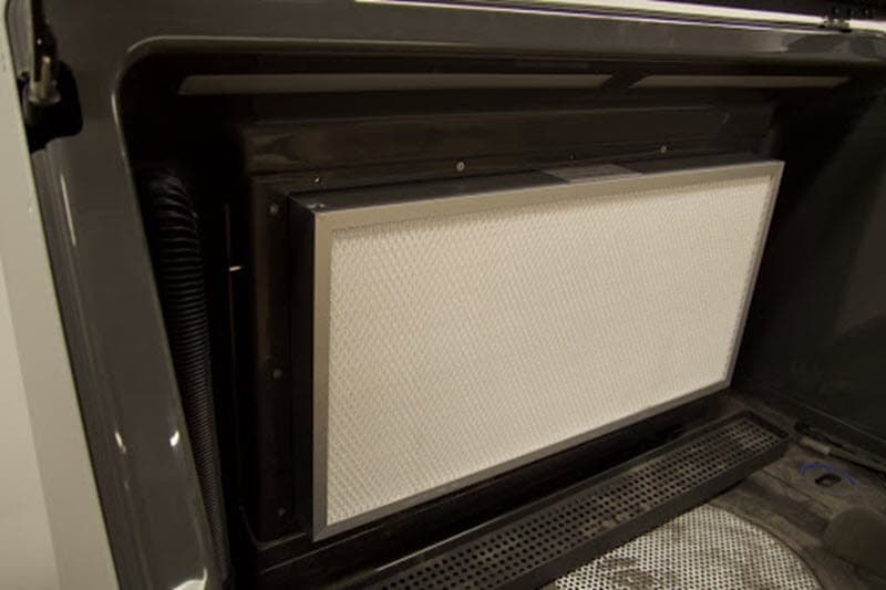 The back panel has a filter inserted without a grate