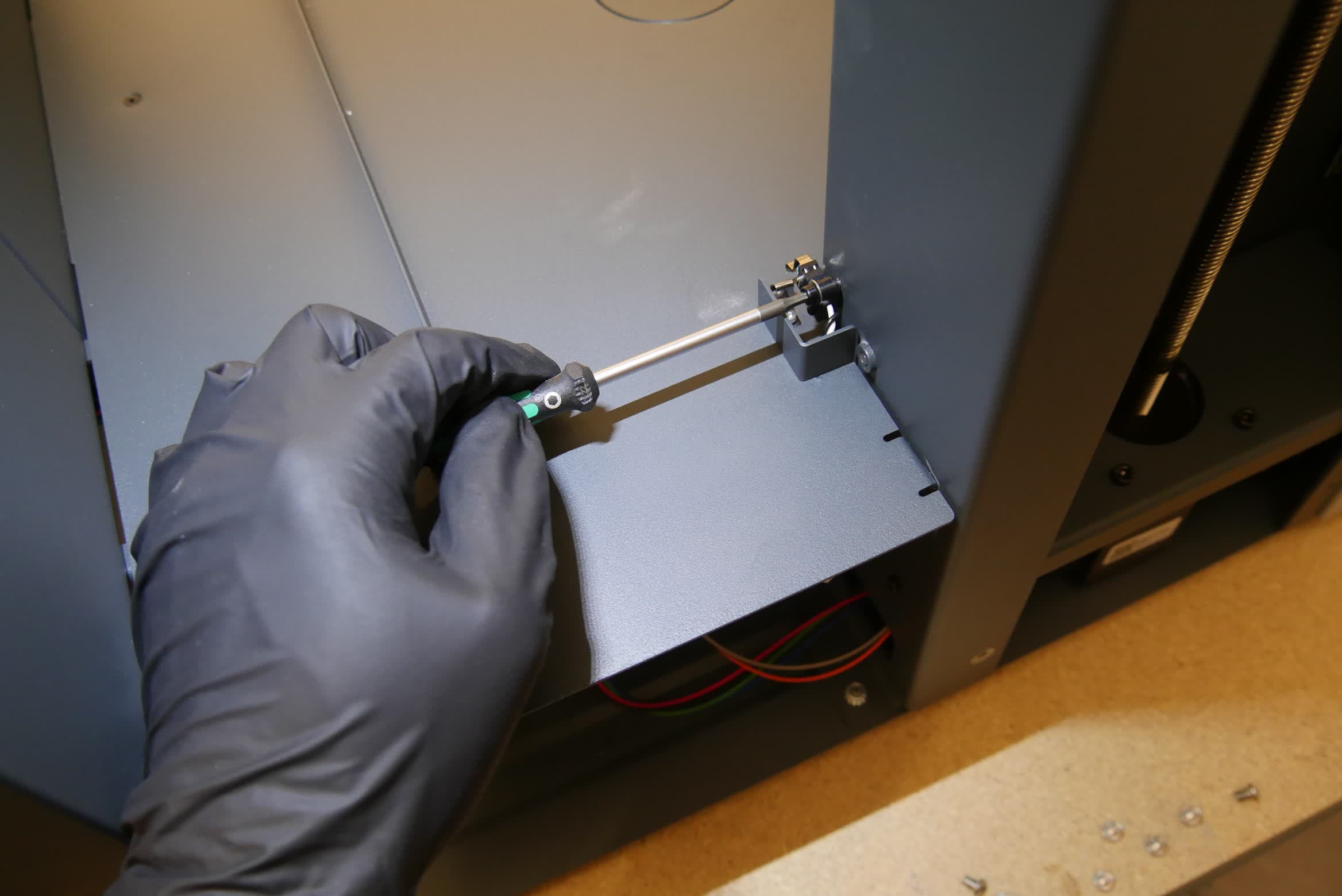 Securing the replacement wash bucket interlock switch