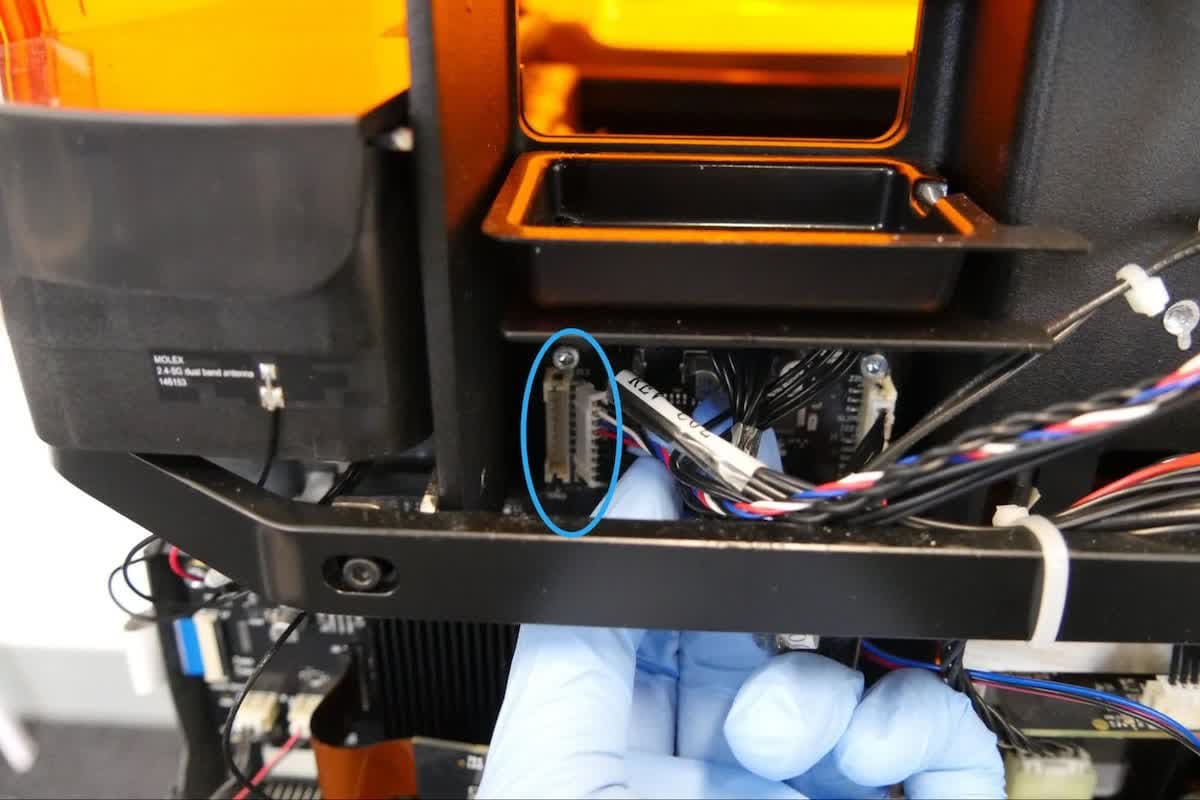 Unplugging the Form 3 cartridge floor cable