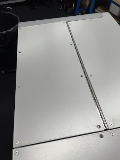 flipped-top-panel-hinge-screw-removal.jpg