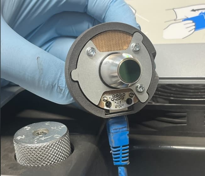 Someone is removing the IR sensor from its mount