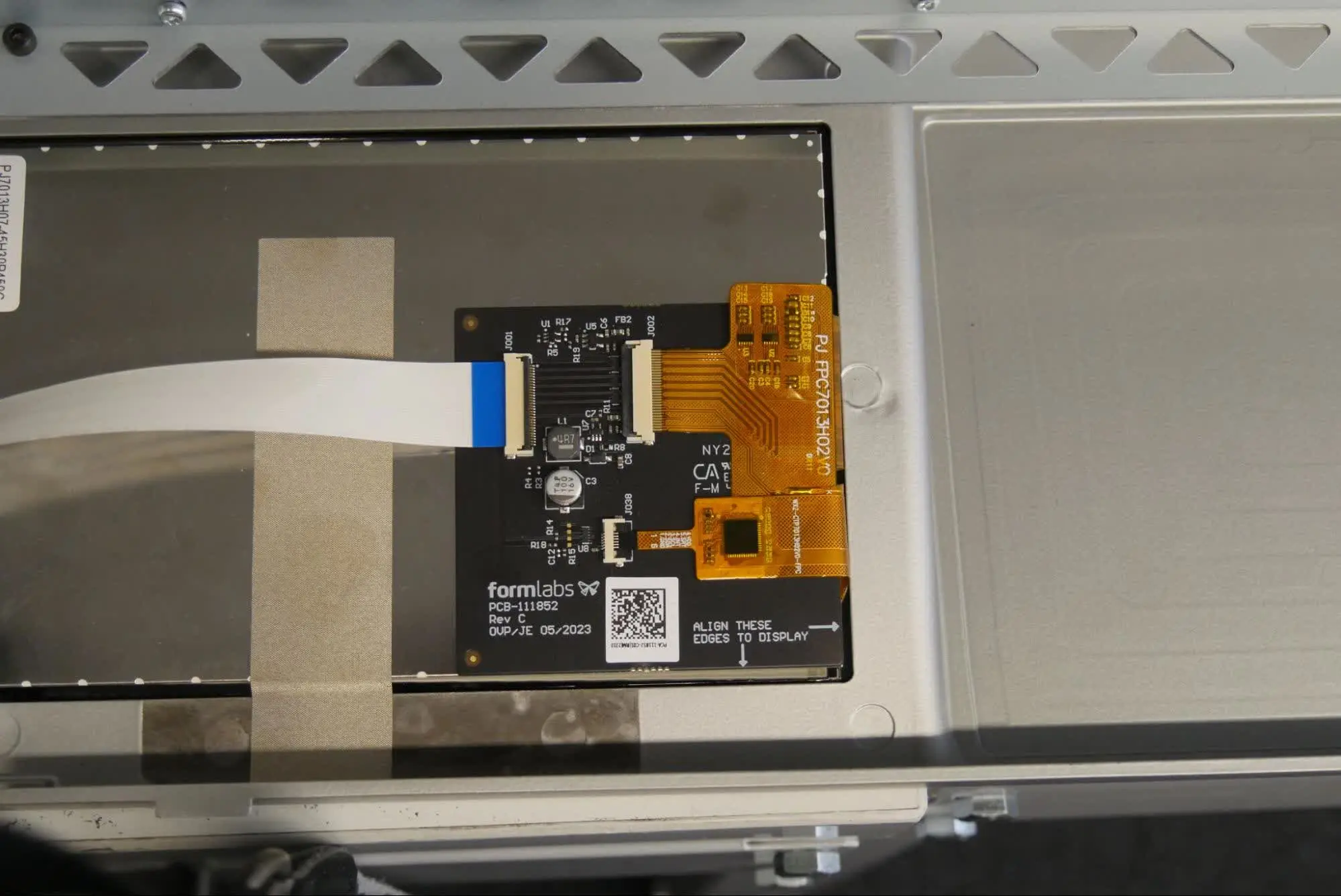 Step 1: Disconnect the touchscreen ribbon cable