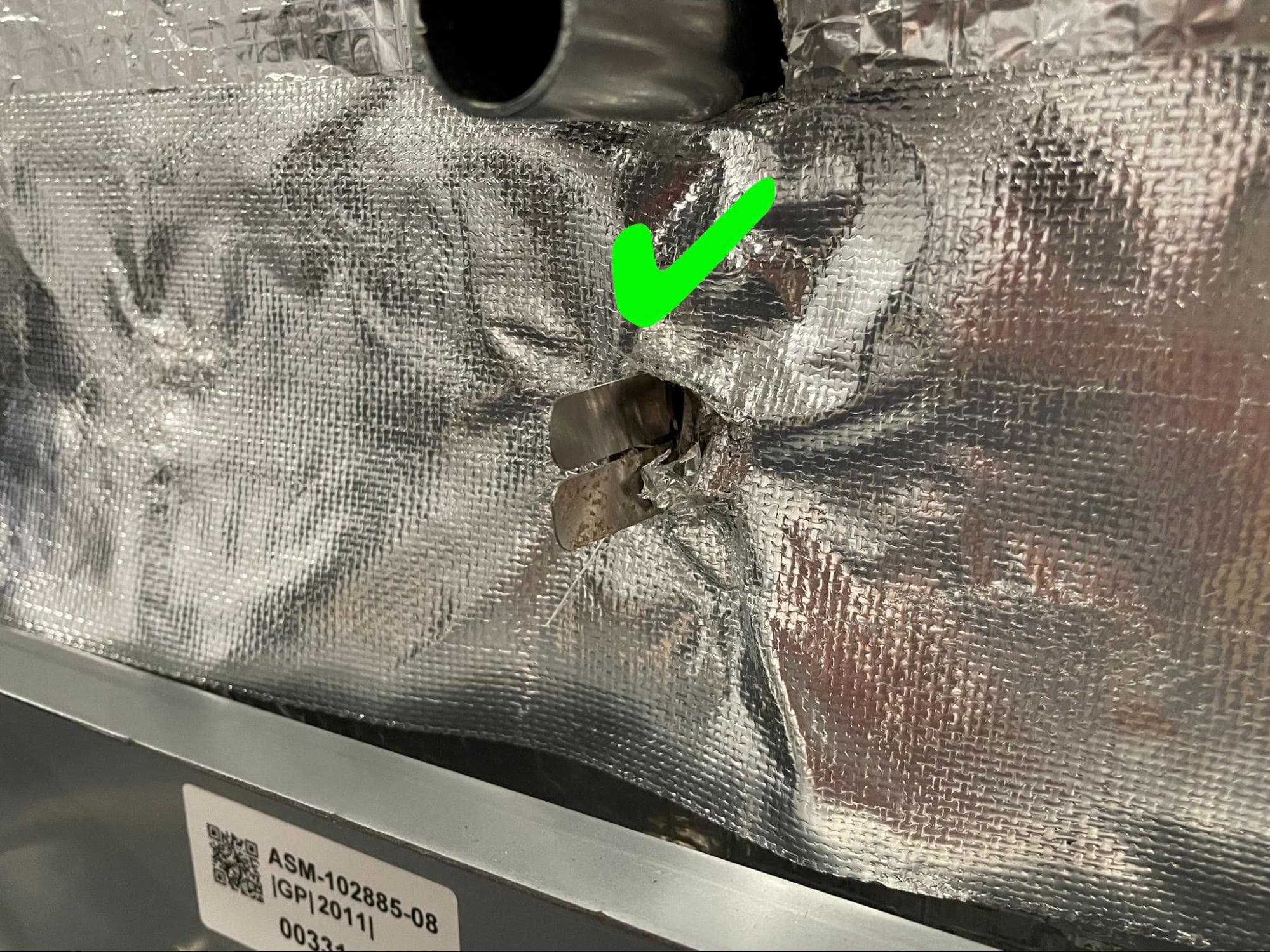 Remove the insulation and inner rear panels