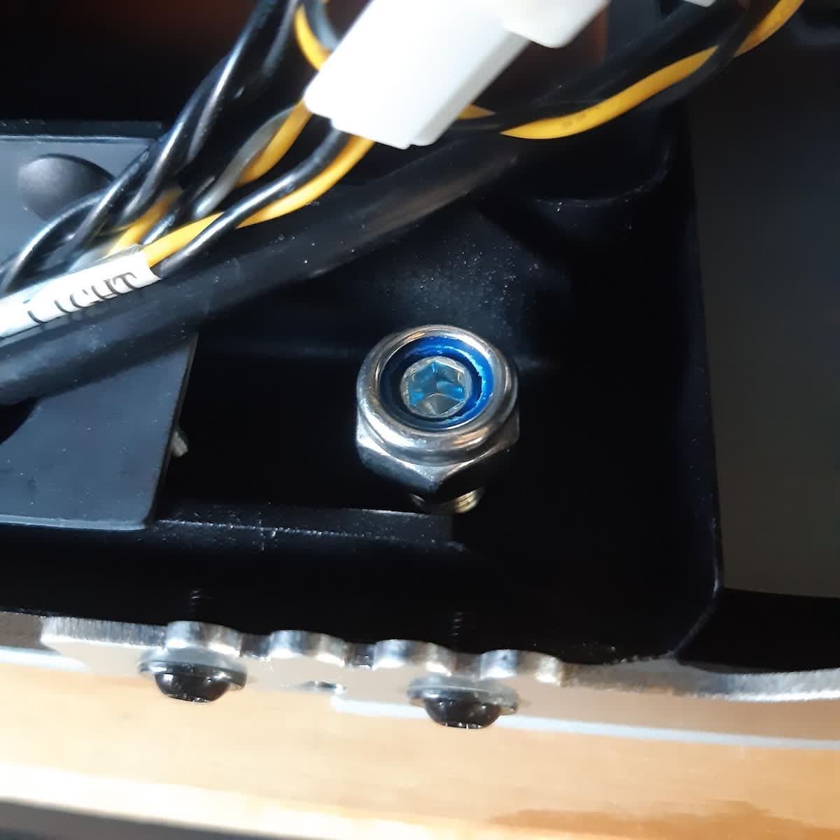 Securing the locknut on the Form 3L replacement leveling foot