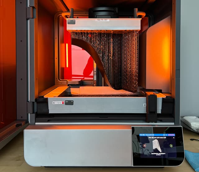 Black part inside Form 4L 3D printer