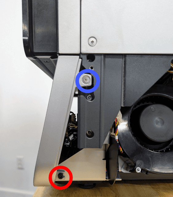 Secure the right front panel retention screws