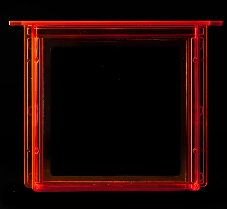 A Form 1+ resin tank with a clear window and no marks
