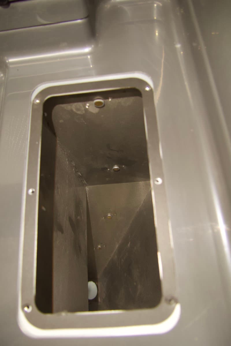 An empty fresh powder hopper