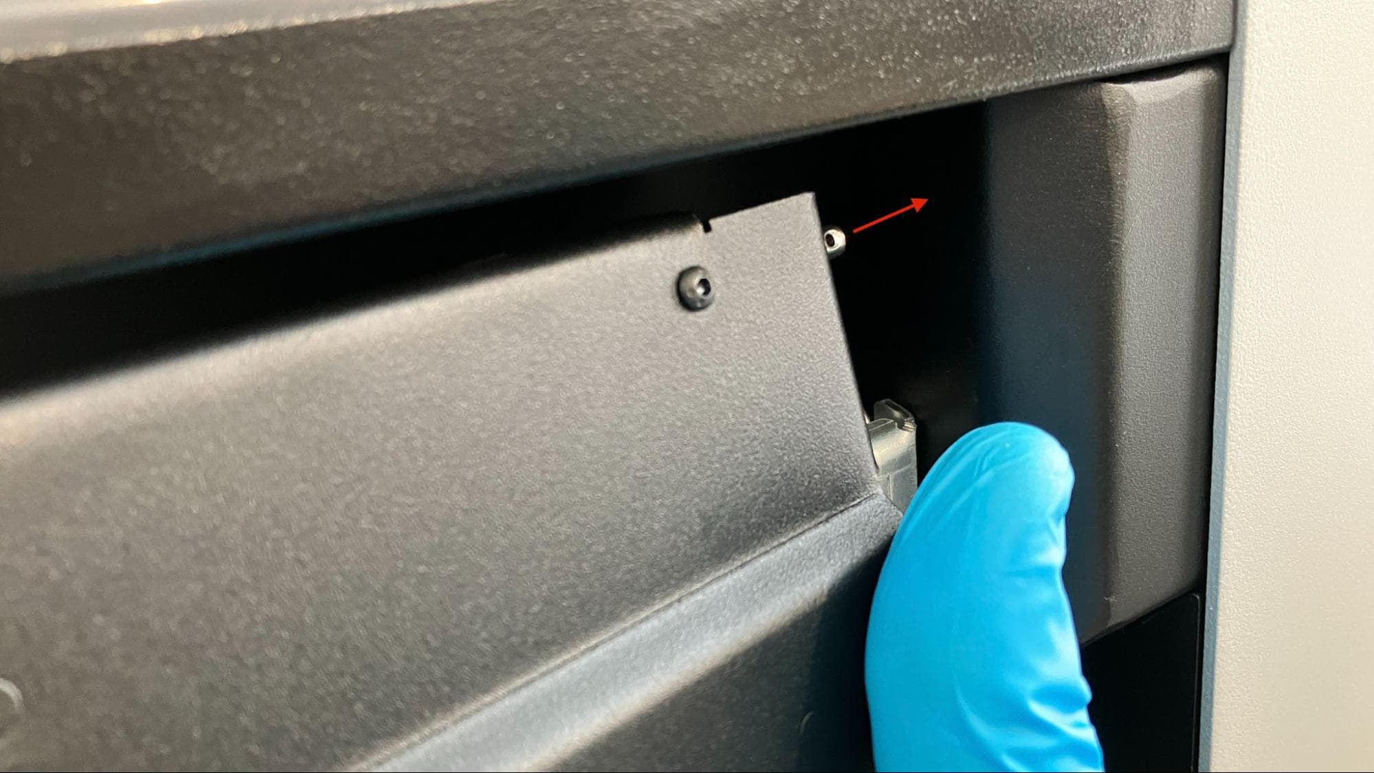 Install the new build chamber latch assembly
