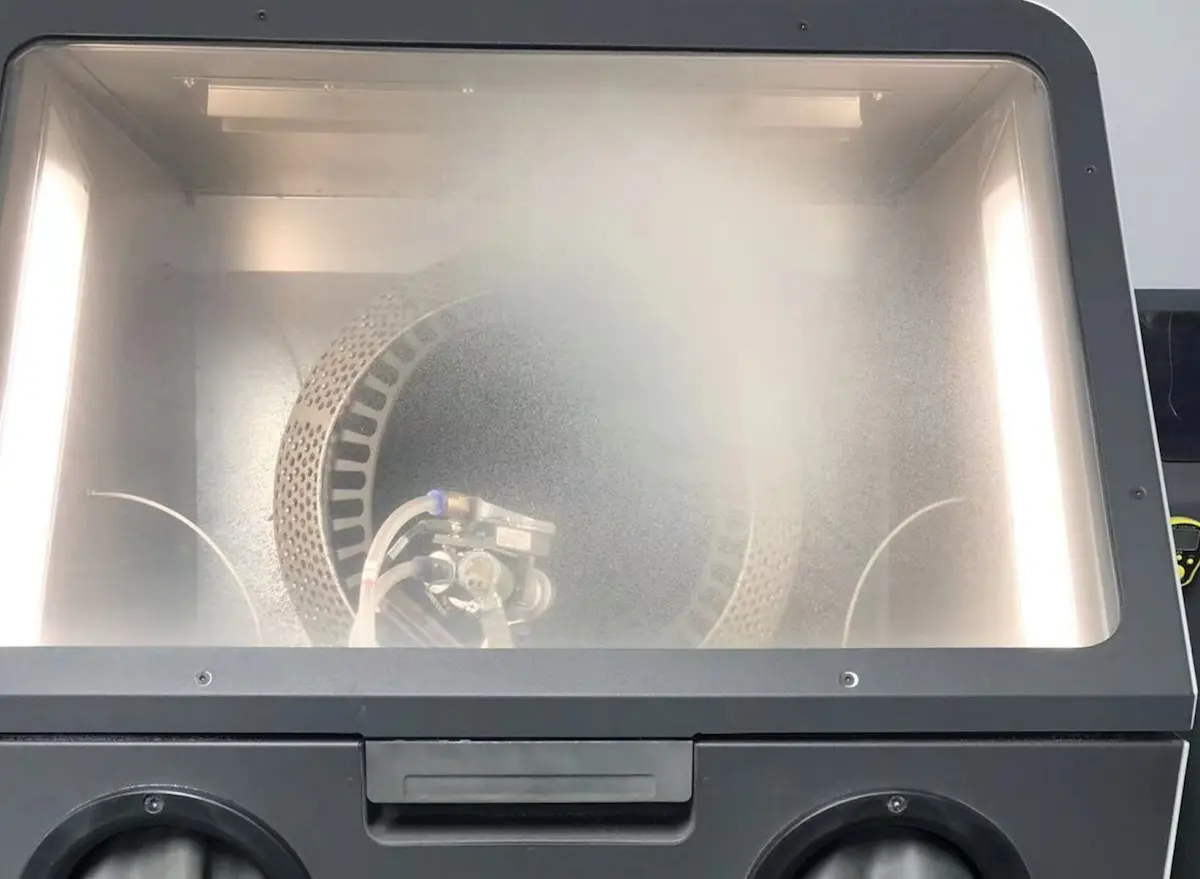 Example of window fogging from 150 hours of blasting with glass media