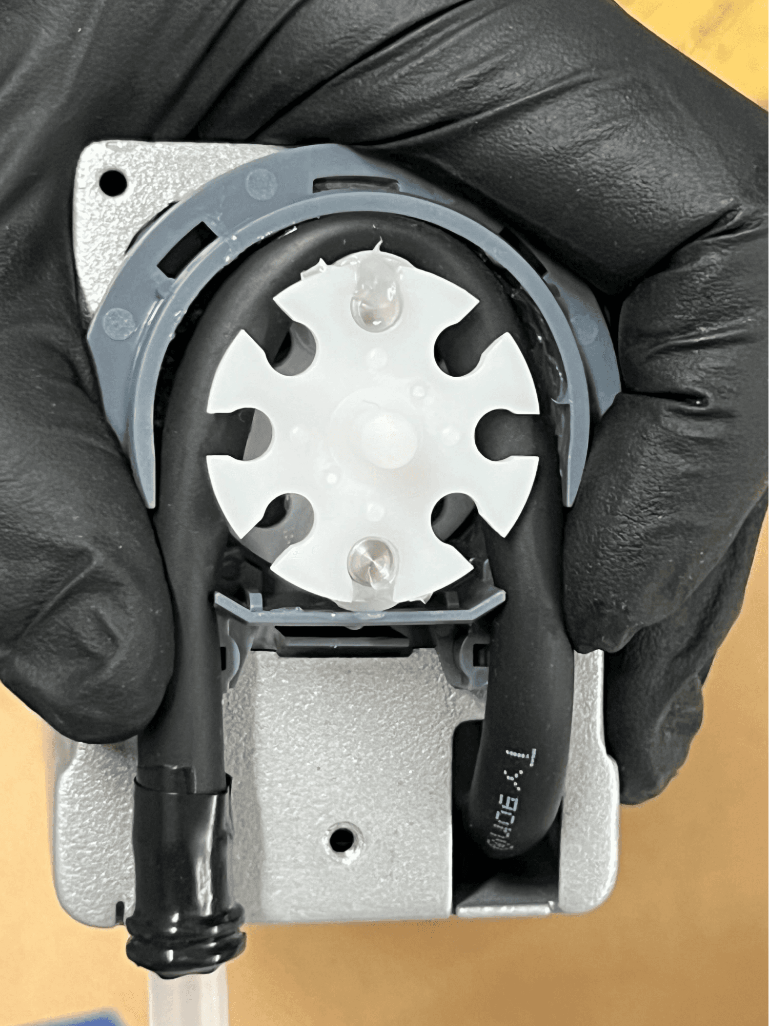 Route the pump tube through the clamp points