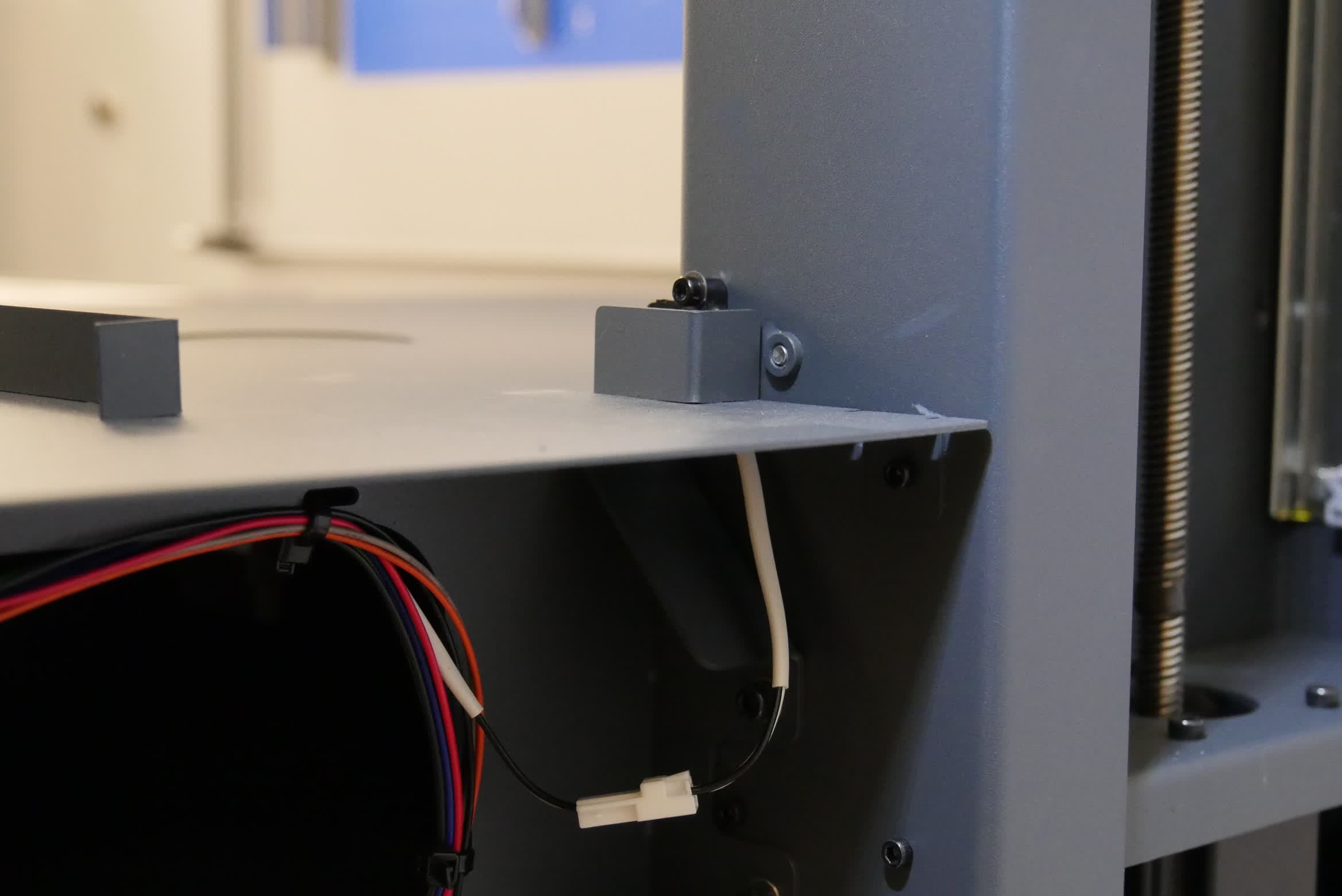 Wash bucket interlock switch, viewed from the rear