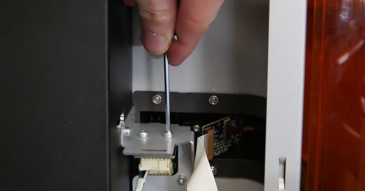 Removing the Form 4 LevelSense board mounting screws