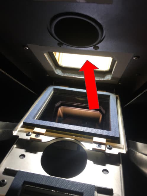 The Fuse 1's print enclosure with an arrow pointing at the upper laser window