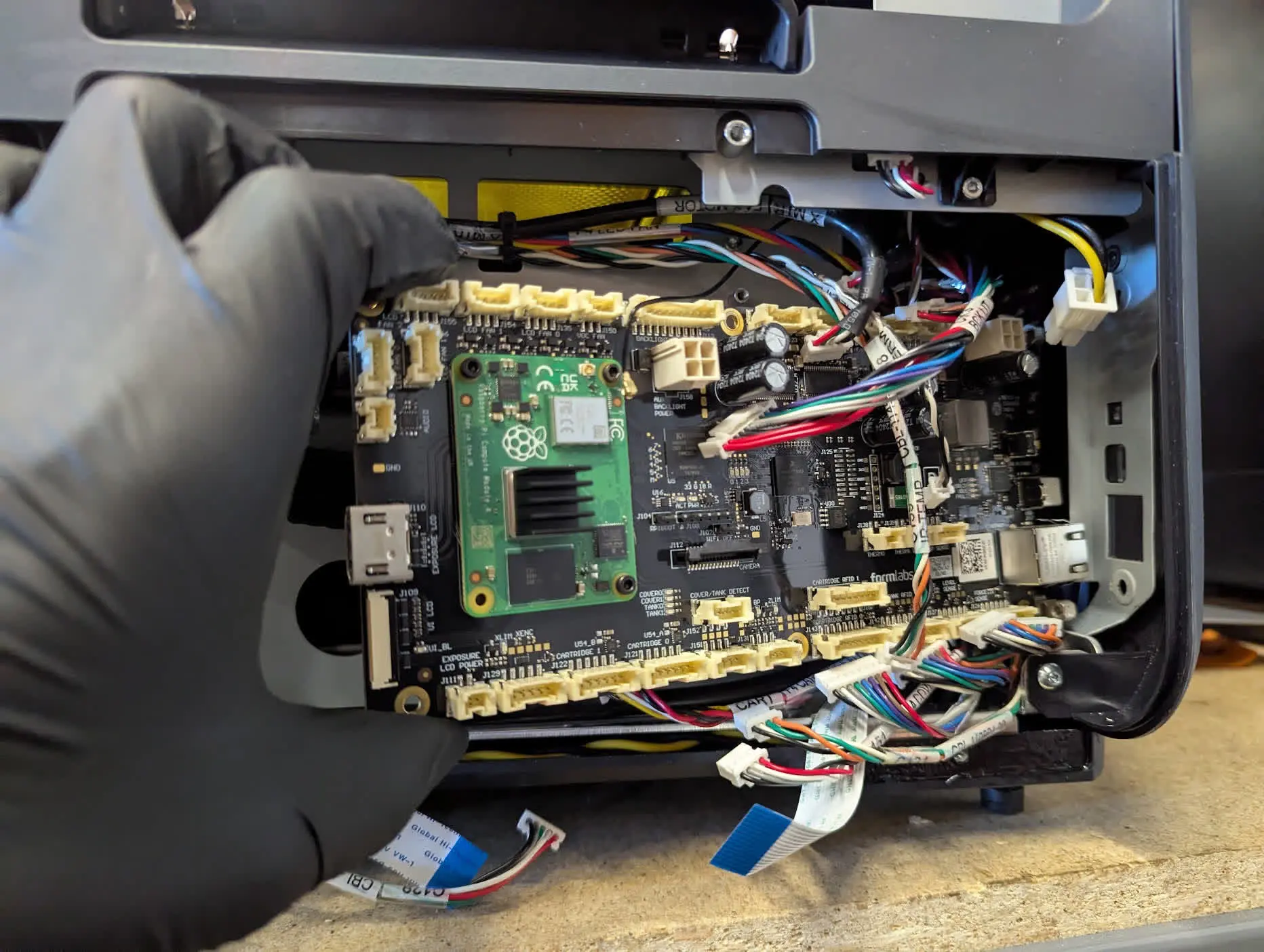 Step 4: Remove the motherboard