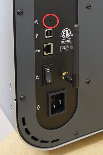 Close up of the rear of the Form Cure L; red circle highlighting Factory Reset button.