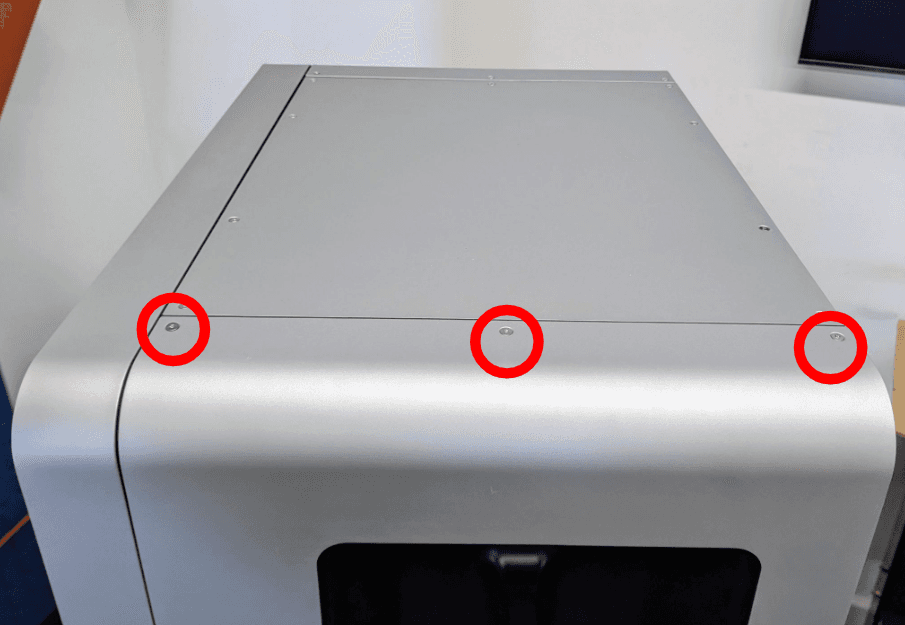 Remove the upper right panel screws