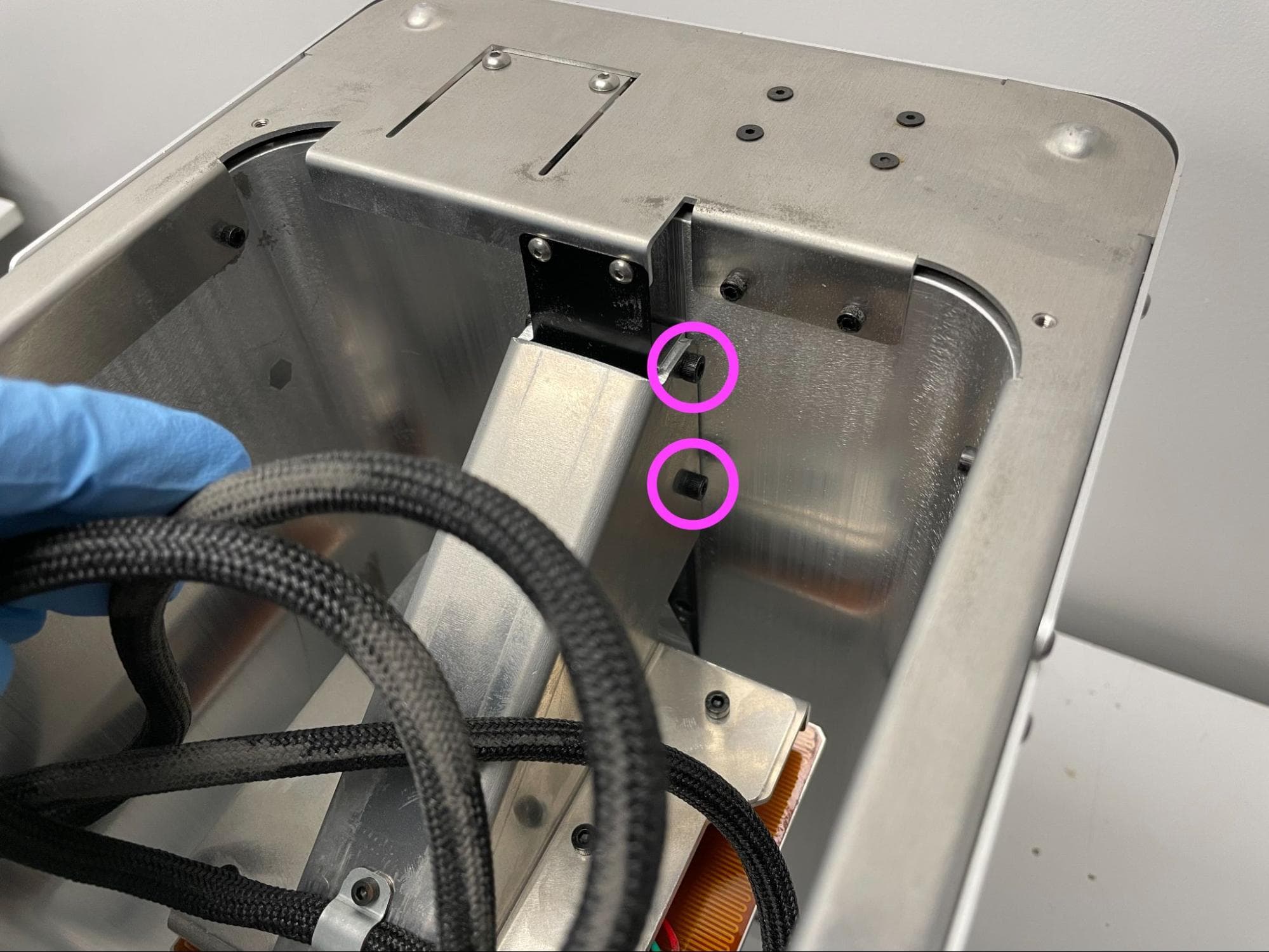 Check the piston arm bracket screws