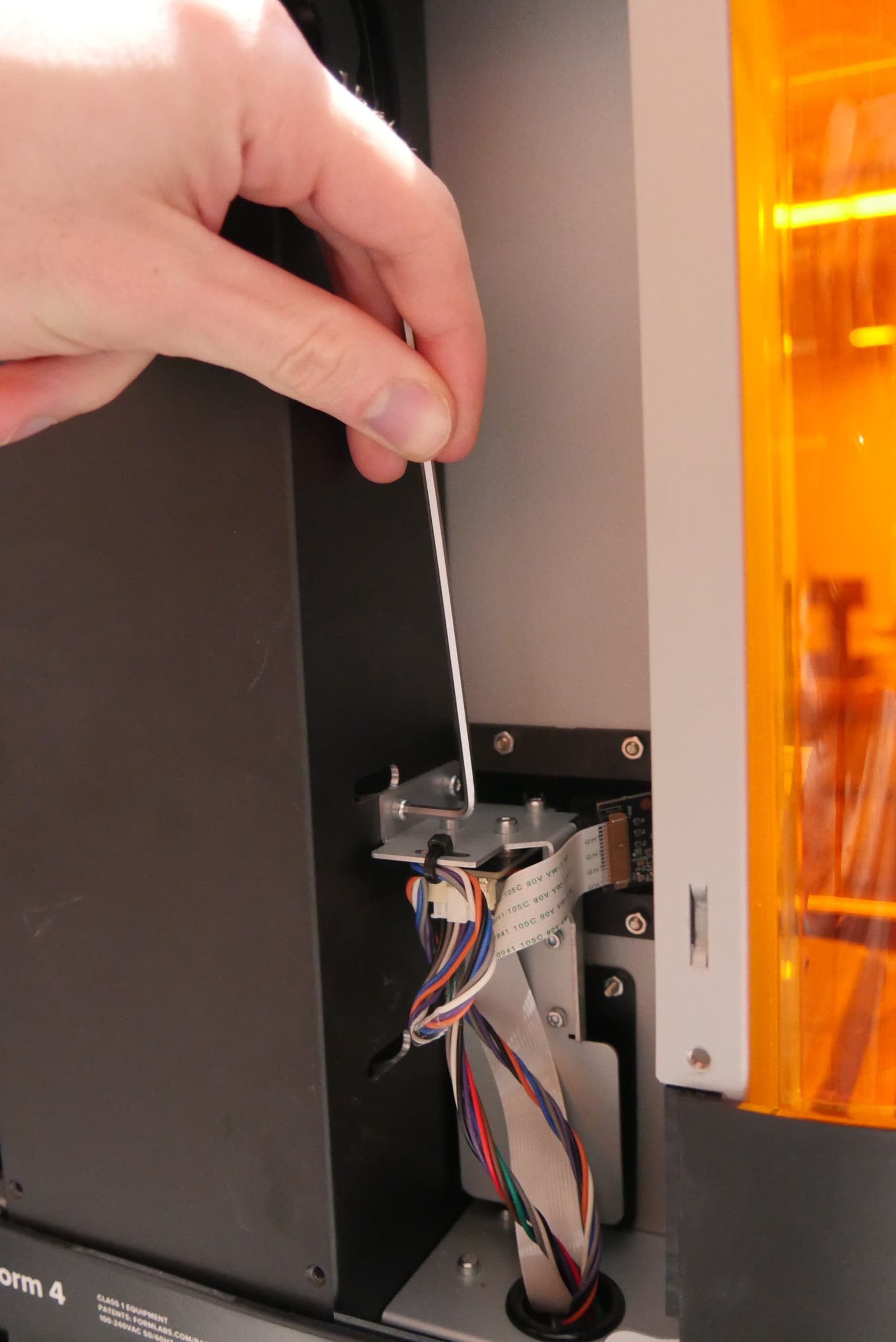 Remove the resin tank RFID bracket