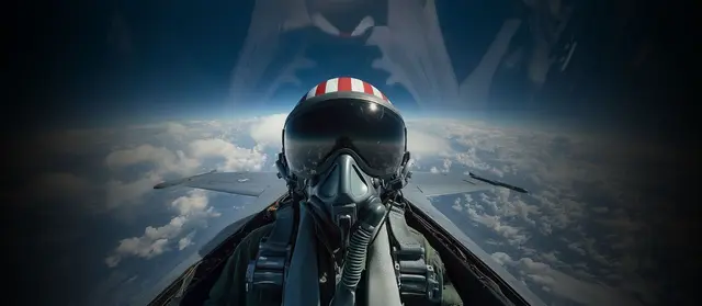 a fighter pilot in the air with sky behind them
