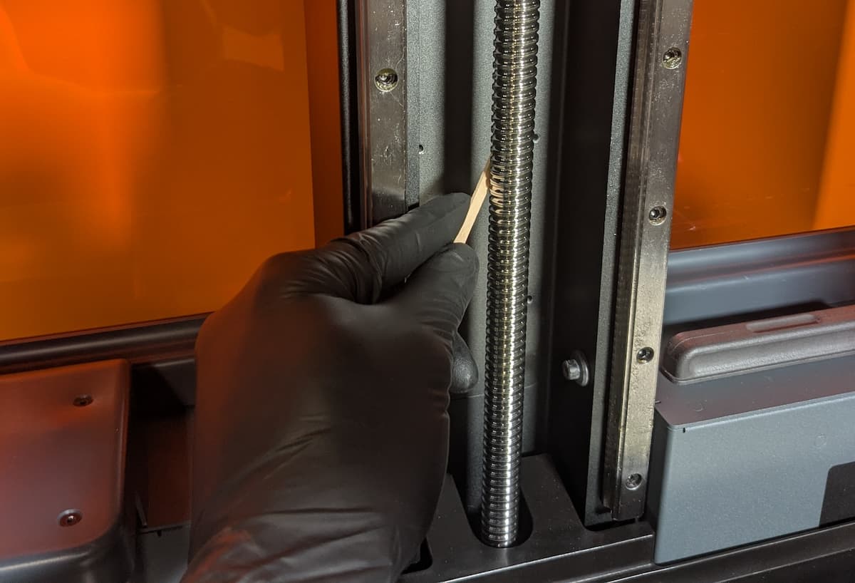 Applying grease to the Form 4L Z-axis lead screw