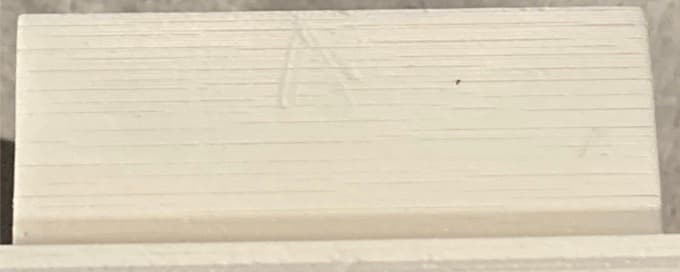 A crack visible on the surface of a part printed in Alumina 4N Resin before firing