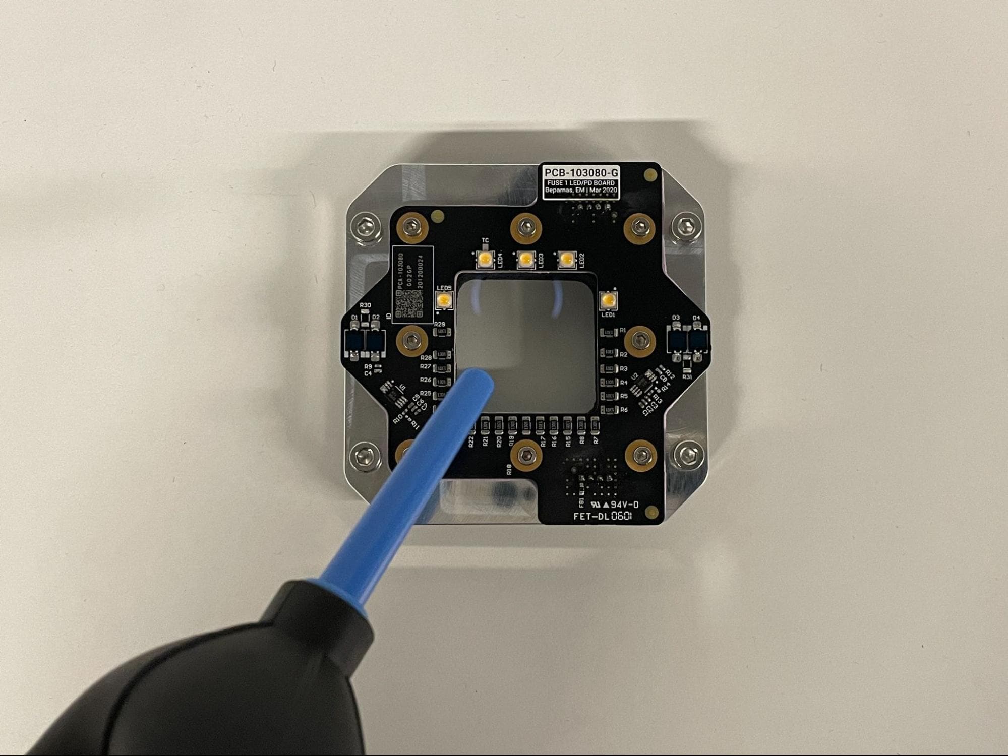 Install the new upper laser window
