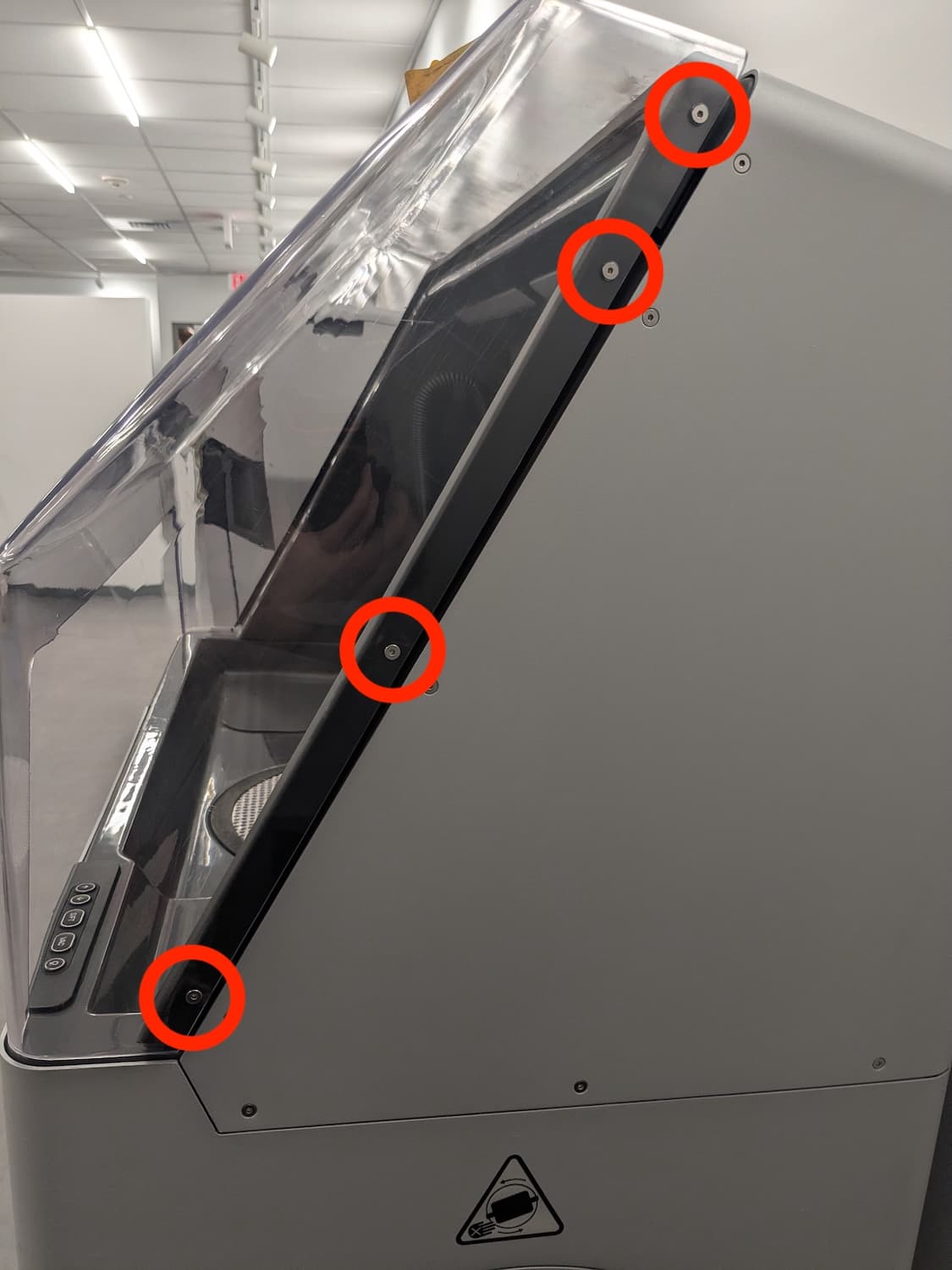Step 1: Remove the hood retention screws