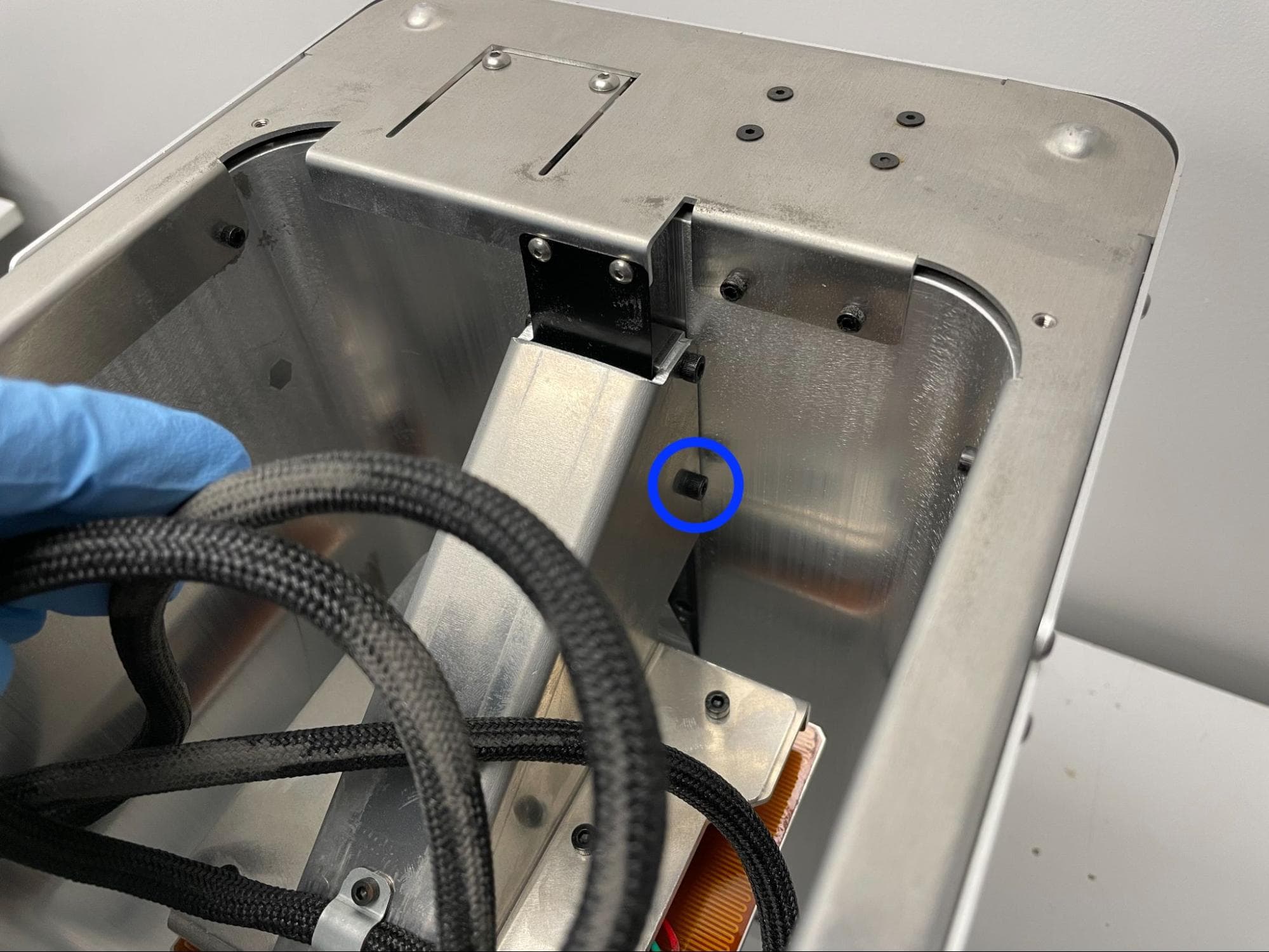 Check the piston arm bracket screws