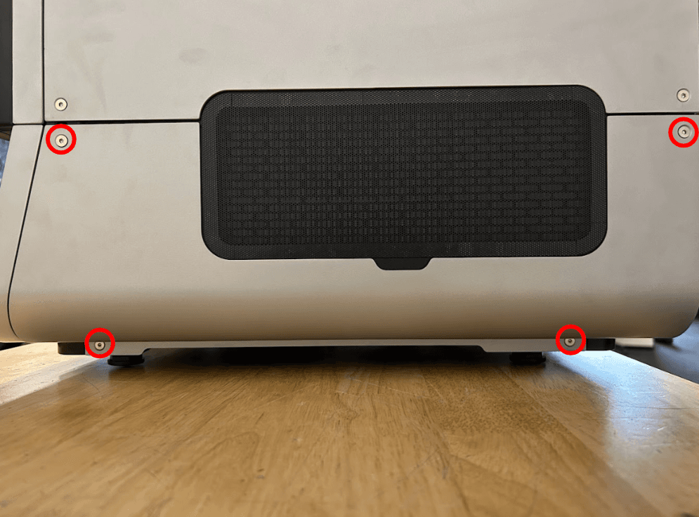 Remove the lower right panel screws