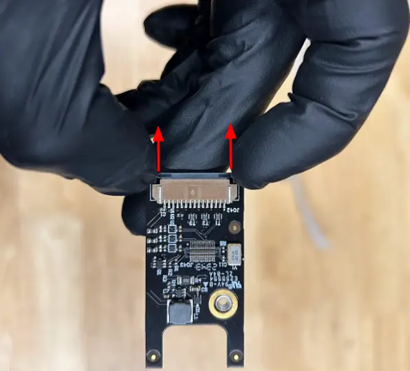 Insert the ribbon cable 2