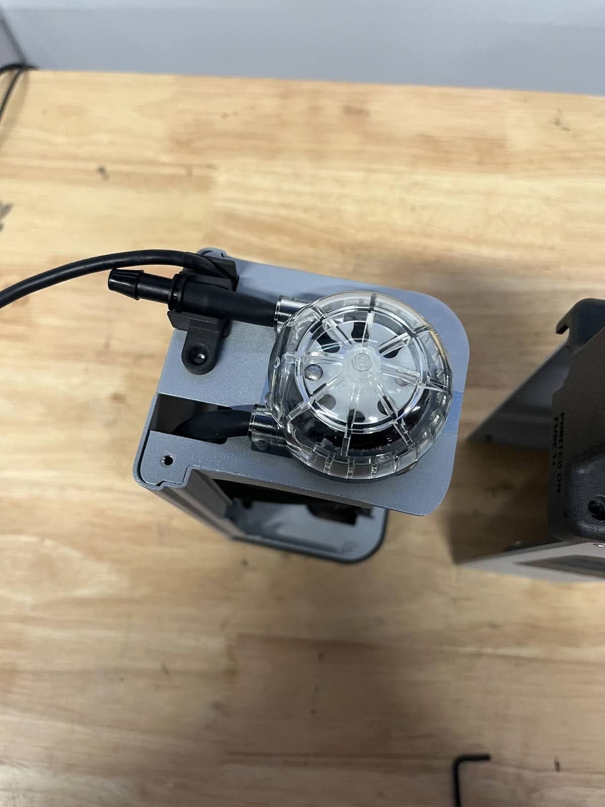 Using a 2 mm hex driver, tighten the screw until finger-tight.