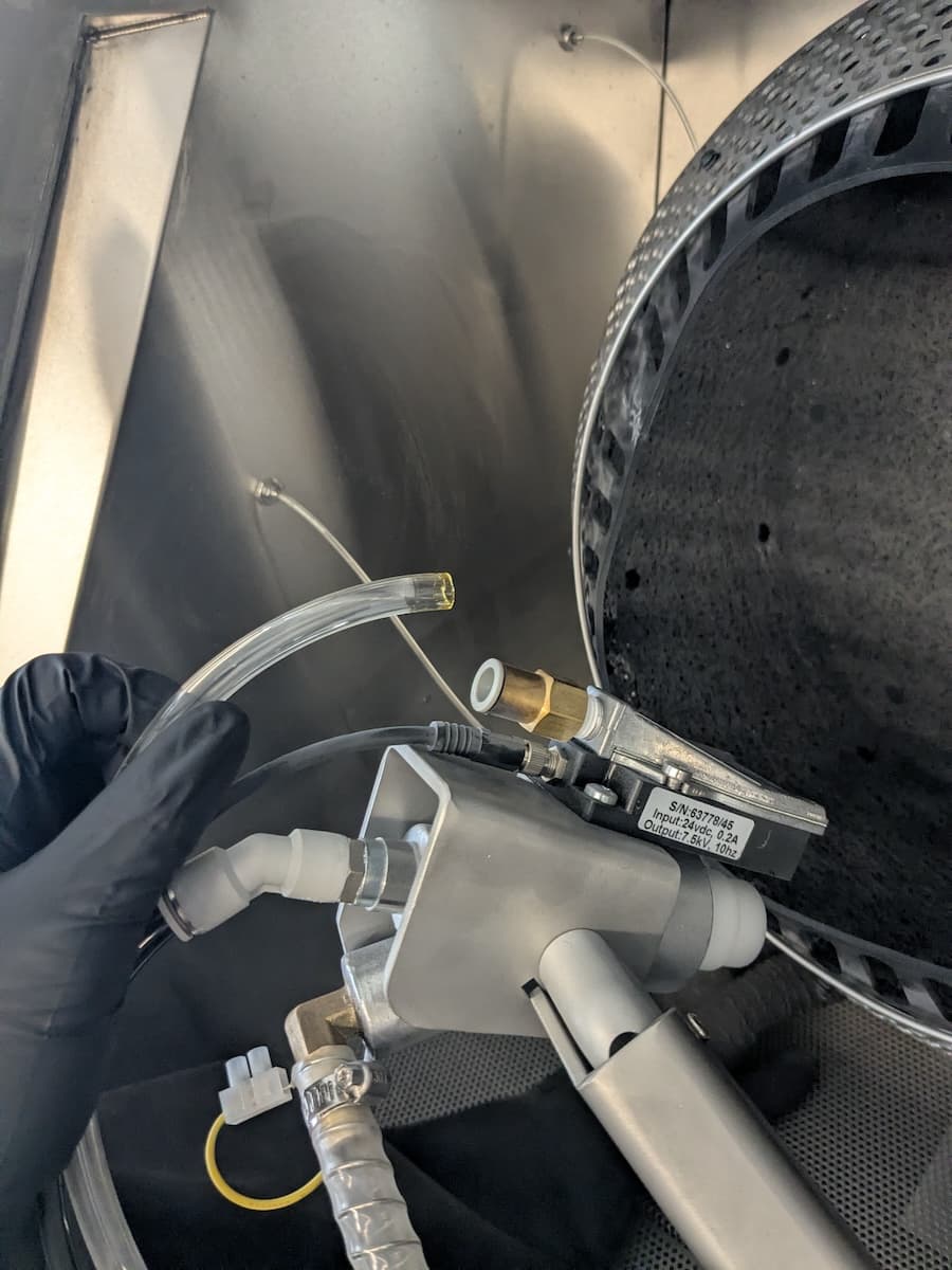 Step 1: Disconnect the part rinse tubing
