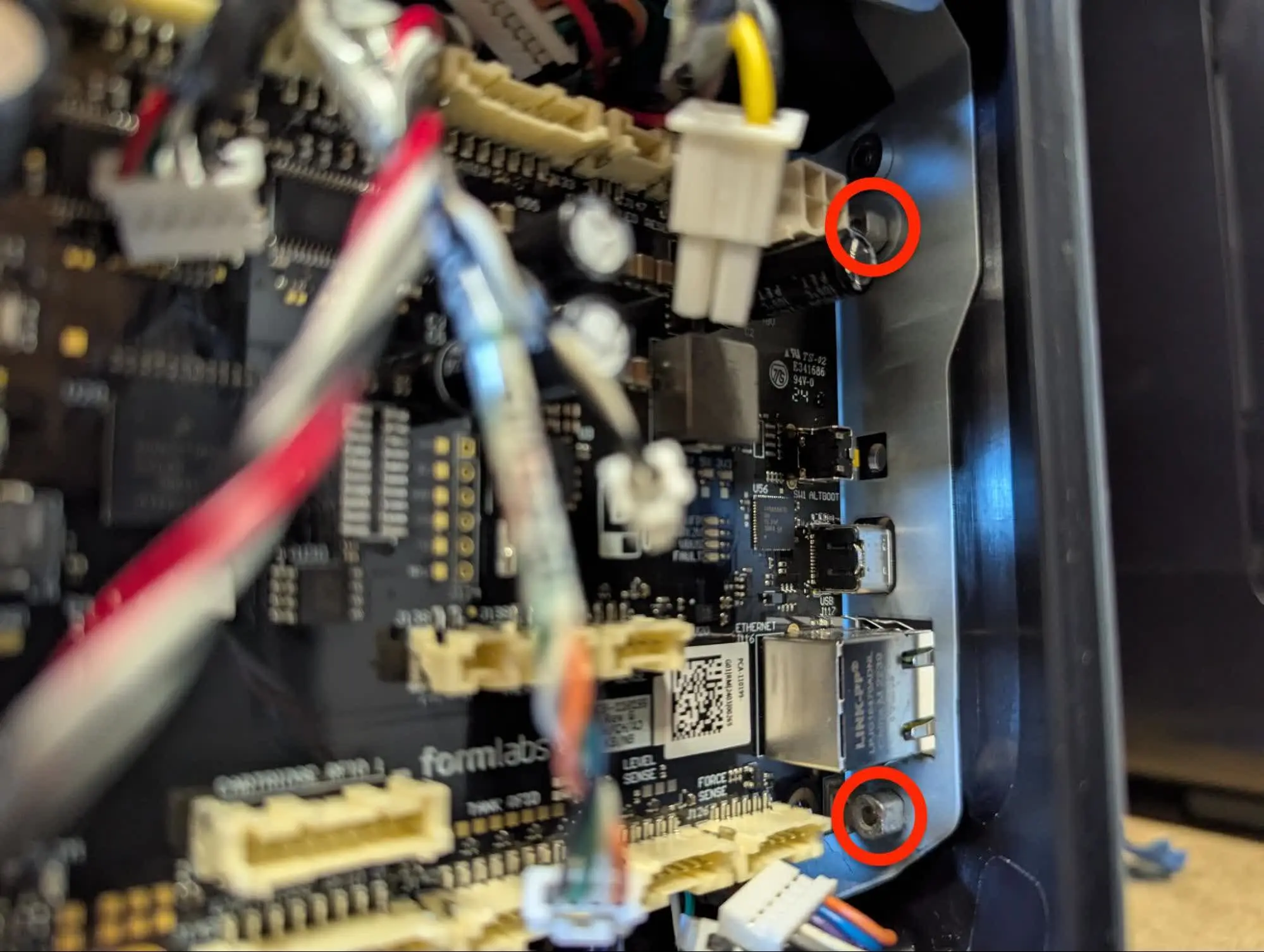 Step 4: Remove the motherboard