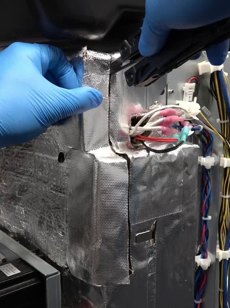 Remove the insulation and inner rear panels
