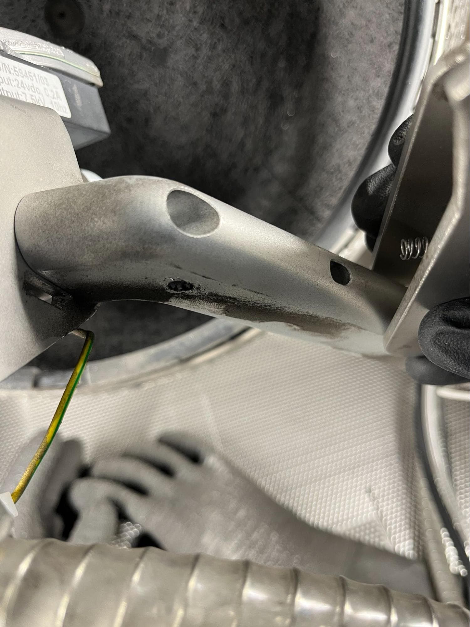 Aligning the handle spring with the blast arm slot step 1