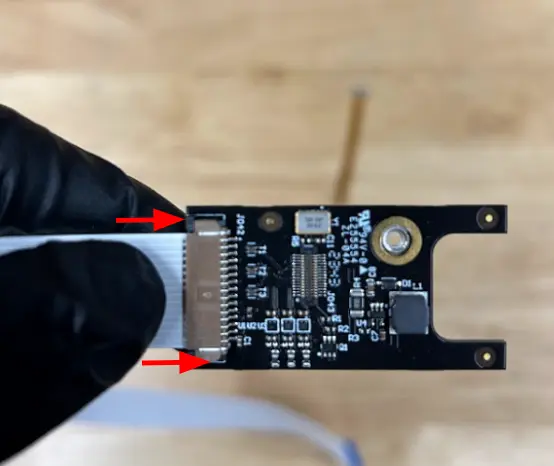 Insert the ribbon cable 4