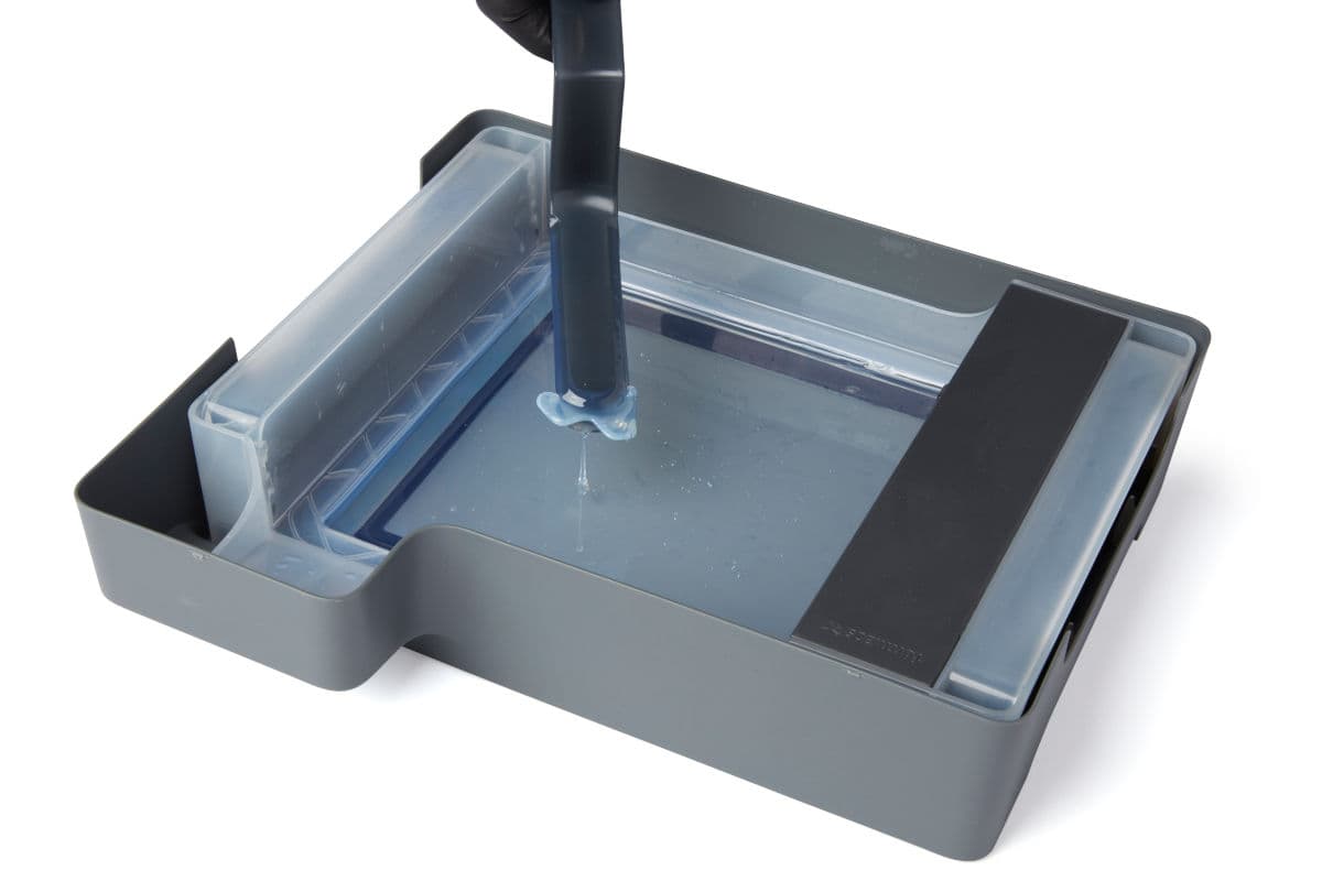 Tweezing cured resin with the tank tool
