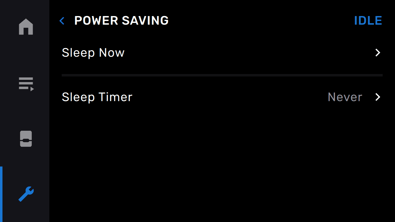 The printer’s touchscreen displays the menu ‘Power Saving’ with two options listed below – ‘Sleep Now’ for entering sleep mode explicitly and ‘Sleep Timer’ to enter sleep mode at a later time