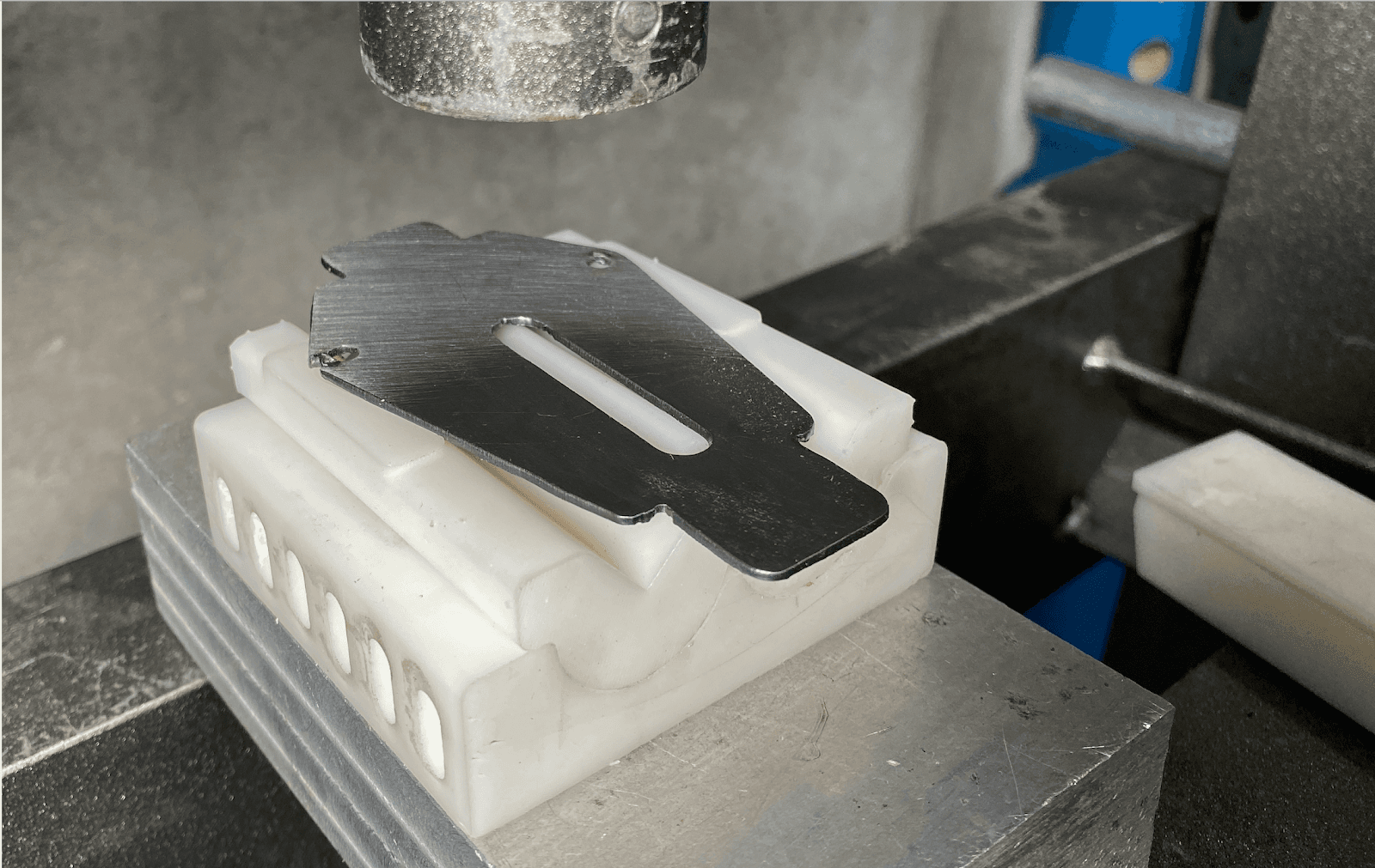 pressing operation for bending the flanges