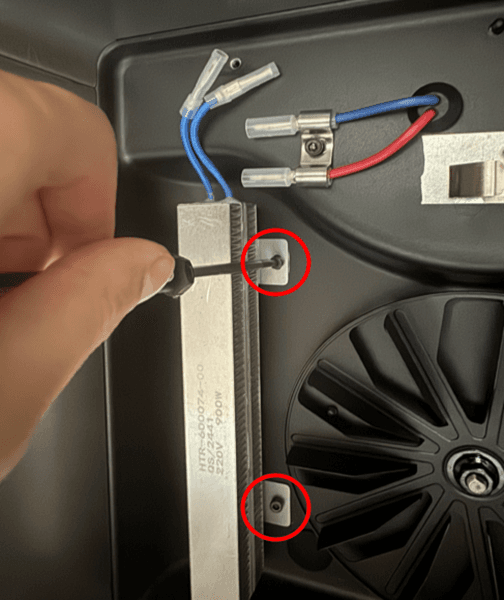Mount and secure the replacement heater.
