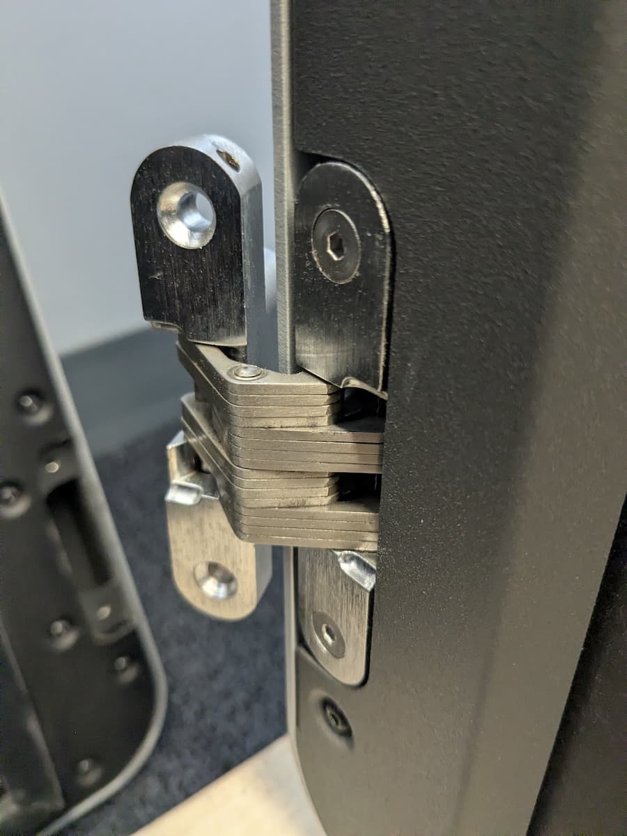Step 2: Mount and secure the hinges onto the printer