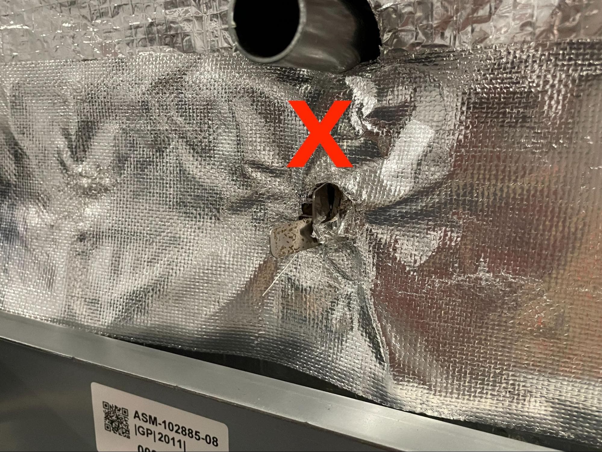 Remove the insulation and inner rear panels